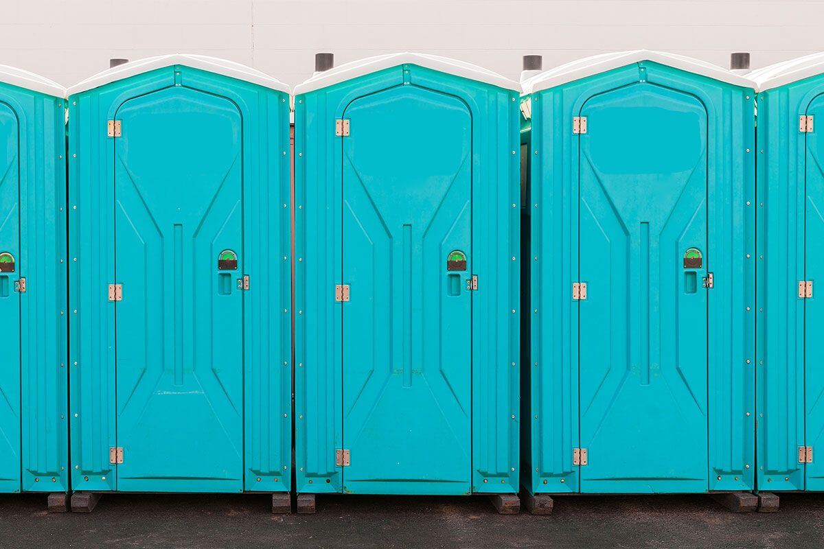 Industrial portable restroom units at a plant in Kennesaw, Georgia